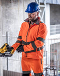 Giacca Softshell ad alta visibilità con tasche con zip | 60617