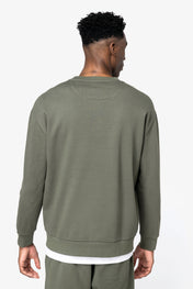 Sudadera unisex con cuello redondo y hombros caídos en polar cepillado ecológico - 350 g/m² - NS435