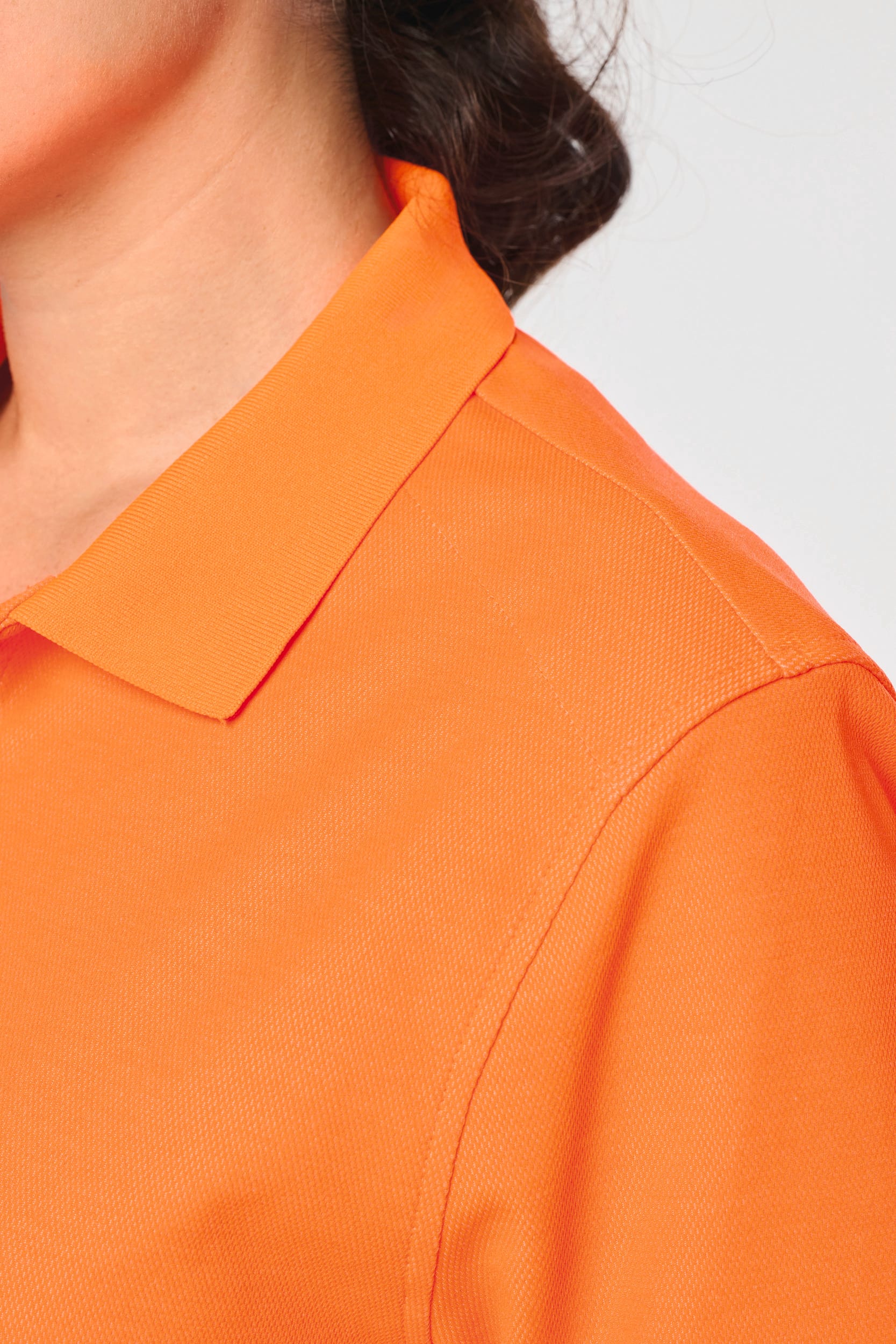 Polo fluorescent unisexe en coton et polyester recyclé | WK208